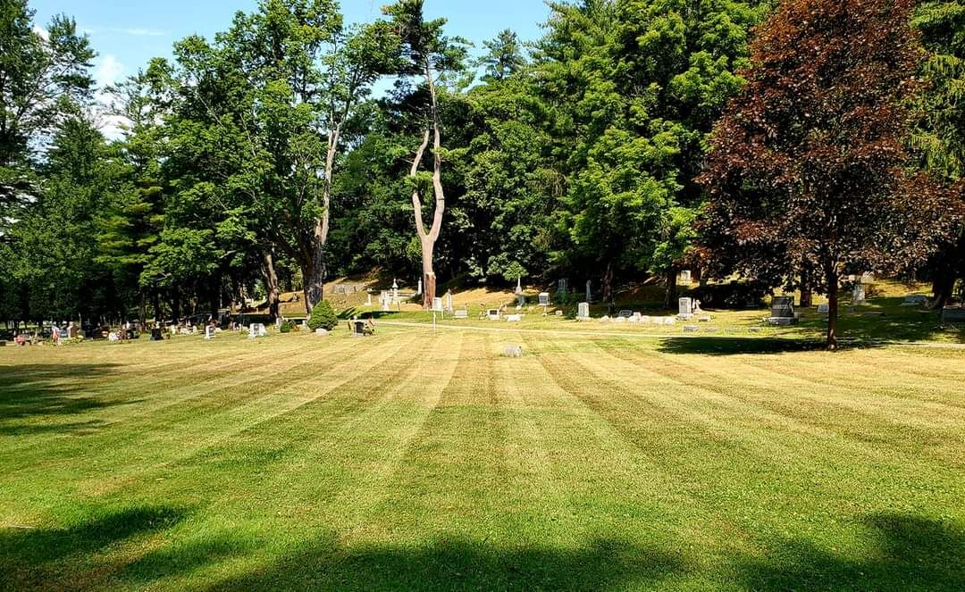 Greenmount Cemetery once again has neatly mowed lawns thanks to People of Action!